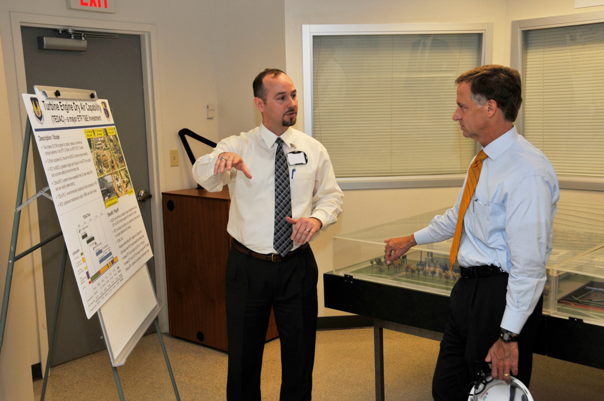 Air Force program manager Kris Hughes explains AEDC’s Turbine Engine Dry Air Capability (TEDAC) to Tennessee Gov. Bill Haslam during the governor’s visit to AEDC March 7. TEDAC will improve plant reliability while reducing AEDC’s environmental risks by replacing thousands of gallons of toxic brine and thousands of pounds of ozone-depleting refrigerant with environmentally-friendly refrigerants and brines. The capability will be used to condition air used in turbine engine altitude testing. The interim capability is expected to be completed in June and the final system is expected to be completed this November. (Photo by Rick Goodfriend)