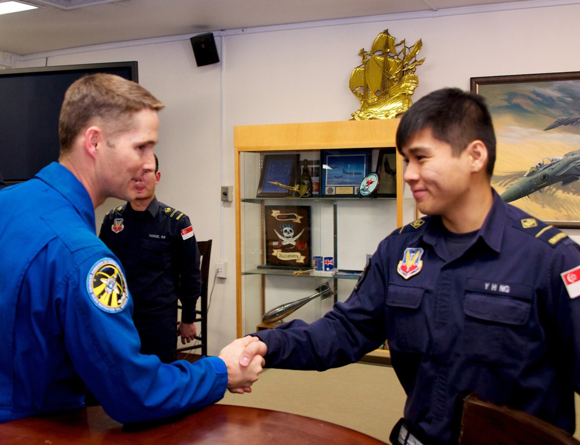 Col. Jim Dutton, NASA Astronaut, meets member of the 428th Fighter Squadron during his visit at Mountain Home Air Force Base, Idaho, March 8, 2012. Dutton was the guest speaker of the National Prayer Luncheon that week. (Courtesy photo)