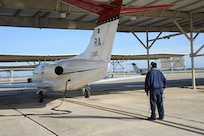 Robert Riojas, 12th Flying Traing Wing Maintenance Division, checks controll surfaces prior the to launch of a T-1 Jayhawk aircraft from the 99th Flying Training Squadron on Joint Base San Antonio-Randolph March 6, 2012. The 99th FTS is an important part of the Pilot Instructor Training program at JBSA-Randolph. (U.S. Air Force photo by Rich McFadden) (released)