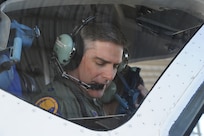 Lt Col. James Drake, 99th Flying Training Squadron instructor pilot, makes final checks prior to the launch of a T-1 Jayhawk aircraft on Joint Base San Antonio-Randolph March 6, 2012. The 99th FTS is an important part of the Pilot Instructor Training program at JBSA-Randolph. (U.S. Air Force photo by Rich McFadden) (released)