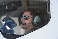 1st Lt. Casey Eikhold, 99th Flying Training Squadron, makes final checks prior to the launch of a T-1 Jayhawk aircraft on Joint Base San Antonio-Randolph, Texas March 6. The 99th FTS is an important part of the Pilot Instructor Training program at JBSA-Randolph. (U.S. Air Force photo by Rich McFadden) (released)