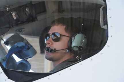 1st Lt. Casey Eikhold, 99th Flying Training Squadron, makes final checks prior to the launch of a T-1 Jayhawk aircraft on Joint Base San Antonio-Randolph, Texas March 6. The 99th FTS is an important part of the Pilot Instructor Training program at JBSA-Randolph. (U.S. Air Force photo by Rich McFadden) (released)