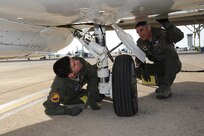 Lt. Col. James Drake (right) and Maj. Kevin Kotula, 99th Flying Training Squadron, make a final inspection prior to the launch of a T-1 Jayhawk aircraft on Joint Base San Antonio-Randolph, Texas March 6. The 99th FTS is an important part of the Pilot Instructor Training program at JBSA-Randolph. (U.S. Air Force photo by Rich McFadden) (released)