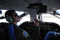 First Lt. Casey Eikhold, 99th Flying Training Squadron, makes final checks prior to the launch of a T-1 Jayhawk aircraft on Joint Base San Antonio-Randolph, Texas March 6. The 99th FTS is an important part of the Pilot Instructor Training program at JBSA-Randolph. (U.S. Air Force photo by Rich McFadden) (released)