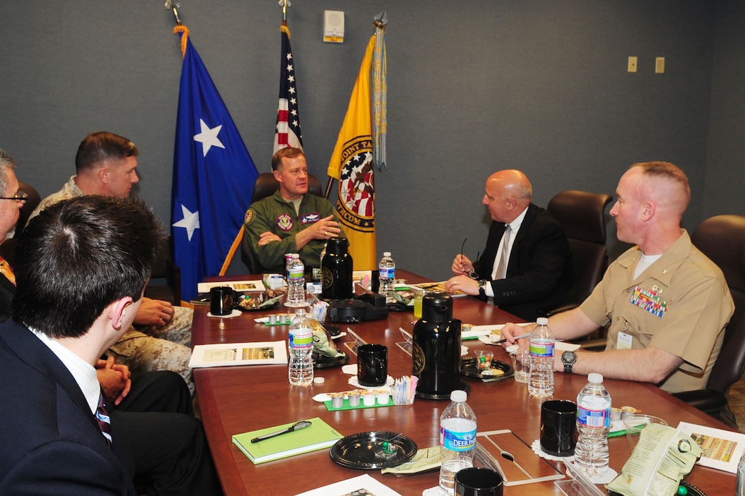 U.S. Air Force Maj. Gen. Jonathan T. Treacy, center, Joint Task Force Civil Support commander, discusses training exercises with Robert G. Salesses, Deputy Assistant Secretary of Defense for Defense Support of Civil Authorities, and other attendees, at the JTF-SC Headquarters, at Fort Eustis, Va., Mar. 12, 2012. Members of the Department of Defense Homeland Security visited the unit to get a closer look at how they conduct their exercises to aide and mitigate federal, state, local and tribal catastrophes.  (U.S. Air Force photo by Staff Sgt. Ashley Hawkins/Released)
