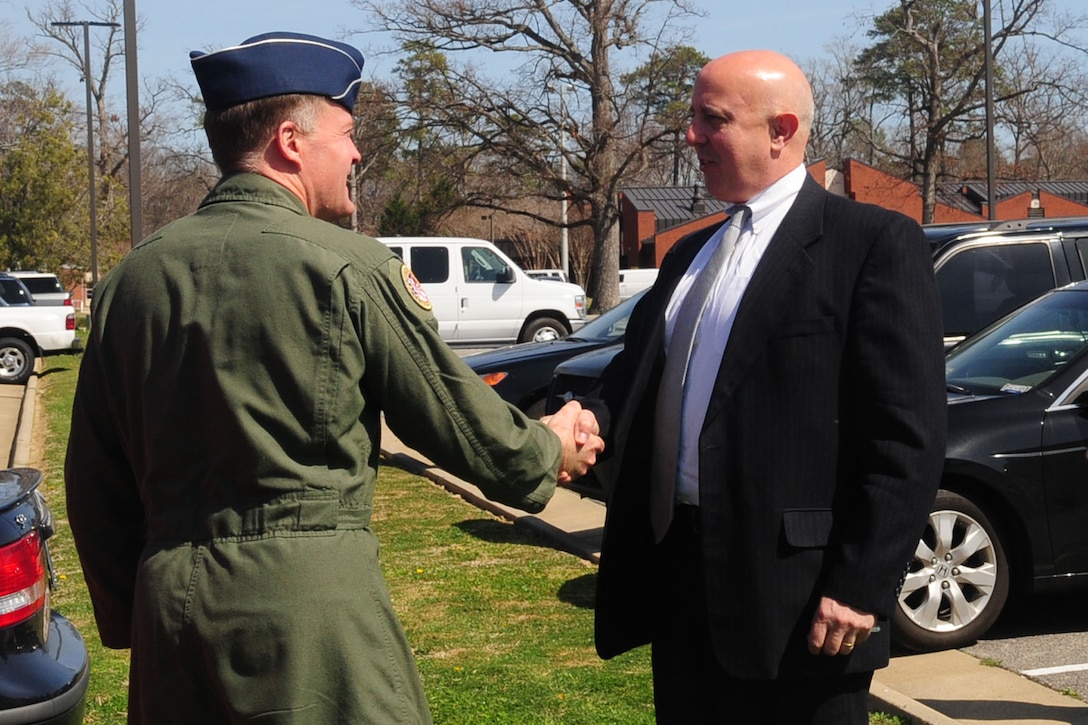 U.S. Air Force Maj. Gen. Jonathan T. Treacy, left, Joint Task Force Civil Support commander, greets Robert G. Salesses, Deputy Assistant Secretary of Defense for Defense Support of Civil Authorities, at the JTF-SC Headquarters at Fort Eustis, Va., Mar. 12, 2012. Salesses visited the commander to discuss JTF-CS’s role in managing the consequences of a domestic chemical, biological, radiological, nuclear and high-yield explosive situation. (U.S. Air Force photo by Staff Sgt. Ashley Hawkins/Released)