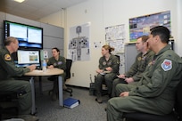 Maj. Bud Gieglr, 99th Flying Training Squadron instructor pilot, conducts a mission briefing prior an early morning mission on a T-1 Jayhawk aircraft on Joint Base San Antonio-Randolph March 6, 2012. The 99th FTS is an important part of the Pilot Instructor Training program at JBSA-Randolph. (U.S. Air Force photo by Rich McFadden) (released)