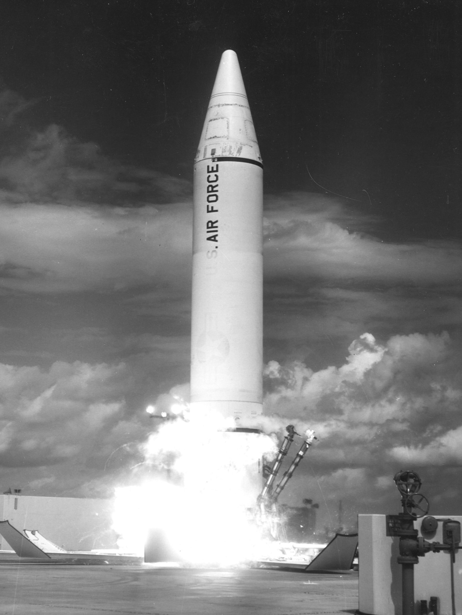 A Rocketdyne LR79 (S-3D) engine ignites during a Jupiter test launch at Cape Canaveral, Florida, in 1960. Note the coating of frost around the missile’s center, caused by cold liquid oxygen. (U.S. Air Force photo).