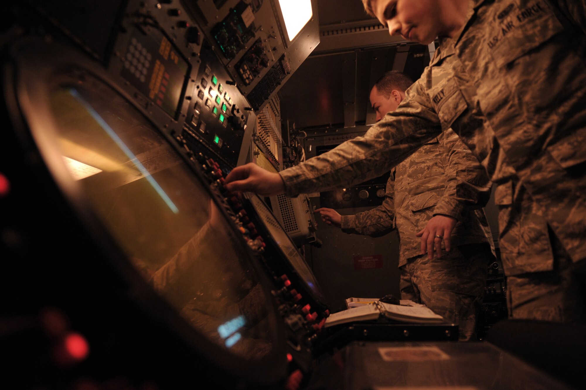 Airman 1st Class Christopher Kelly, 71st Expeditionary Air Control Squadron radar maintenance technician and native of Denver, performs diagnostic tests on a TPS-75 radar here March 13, 2012. The 71st EACS controls the airspace over Afghanistan, coordinating close air support, surveillance, special operations, and air refueling missions for both aircraft and troops on the ground. (U.S. Air Force photo/Staff Sgt. Nathanael Callon)