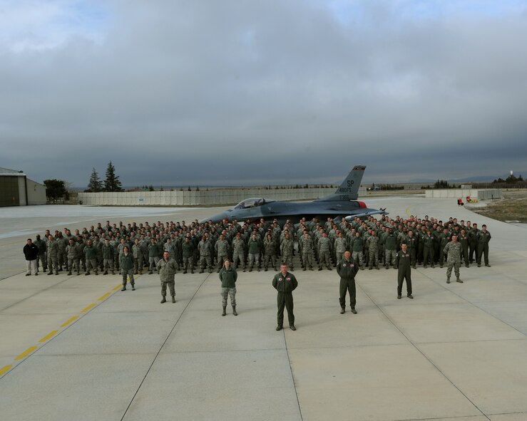 KONYA, Turkey -- Airmen from Spangdahlem Air Base who participated in Anatolian Falcon 2012 pose for a group photo on the flightline here March 14. The U.S. and Turkish air forces were flying together during AF12 in an effort to strengthen relationships and ensure regional peace and stability. (U.S. Air Force photo/Staff Sgt. Benjamin Wilson)
