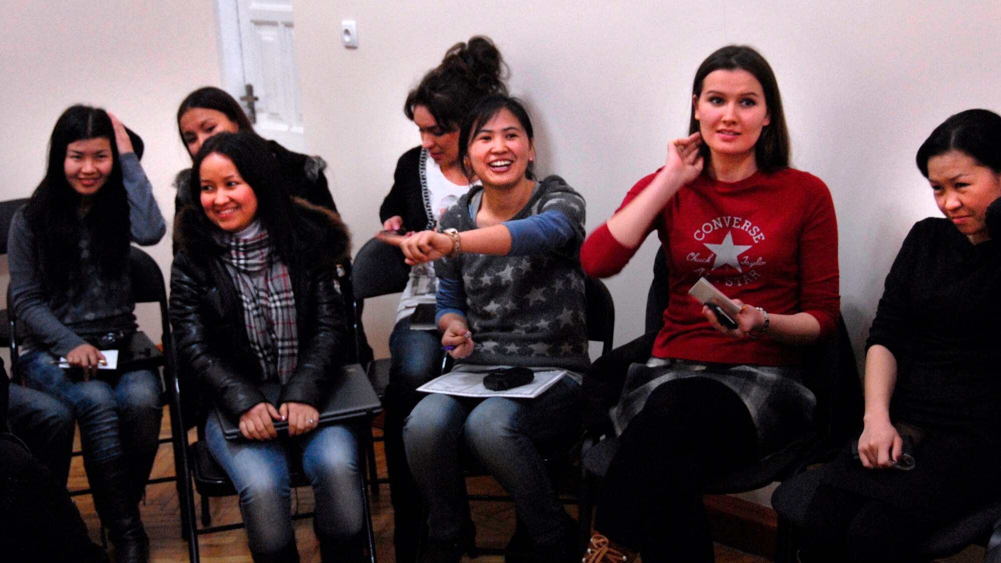 Kyrgyz Republic students laugh during an American Corner discussion on health and wellness at Bayalinov Children's Library in Bishkek March 14, 2012. More than 20 students attended this week's meeting. (U.S. Air Force photo/Senior Airman Lynsie Nichols).