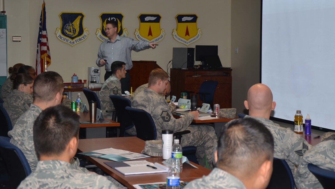 Jerry Stonecipher from the Air Force Institute of Technology instructs students both Air Force and civilian during the seven-day Combat Logistics course at Andersen Air Force Base, Guam March 13.  The course is designed to prepare Air Force logisticians to operate in today's combat environment by providing a foundation of joint and multinational logistics doctrine, and how the doctrine relates to real world scenarios.  (U.S. Air Force photo/Senior Airman Veronica McMahon)