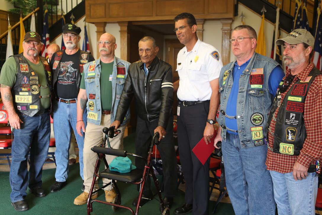 Members of the Delaware Valley Chapter of the Nam Knights of America gathered with John Crazy Bear and his family for a ceremony aboard Marine Corps Base Camp Lejeune, March 17. Crazy Bear, a Lakota Sioux, lost received the dog tag he lost in the Vietnam War during the ceremony.