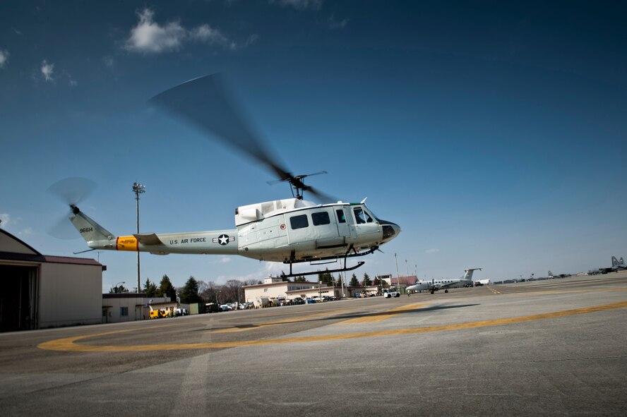 YOKOTA AIR BASE, Japan -- A UH-1N Iroquois takes off at Yokota Air Base, Japan, March 15, 2012. UH-1Ns are primarily used at Yokota for rapid transit in and out of the downtown Tokyo area for base officials. (U.S. Air Force photo/Staff Sgt. Samuel Morse)