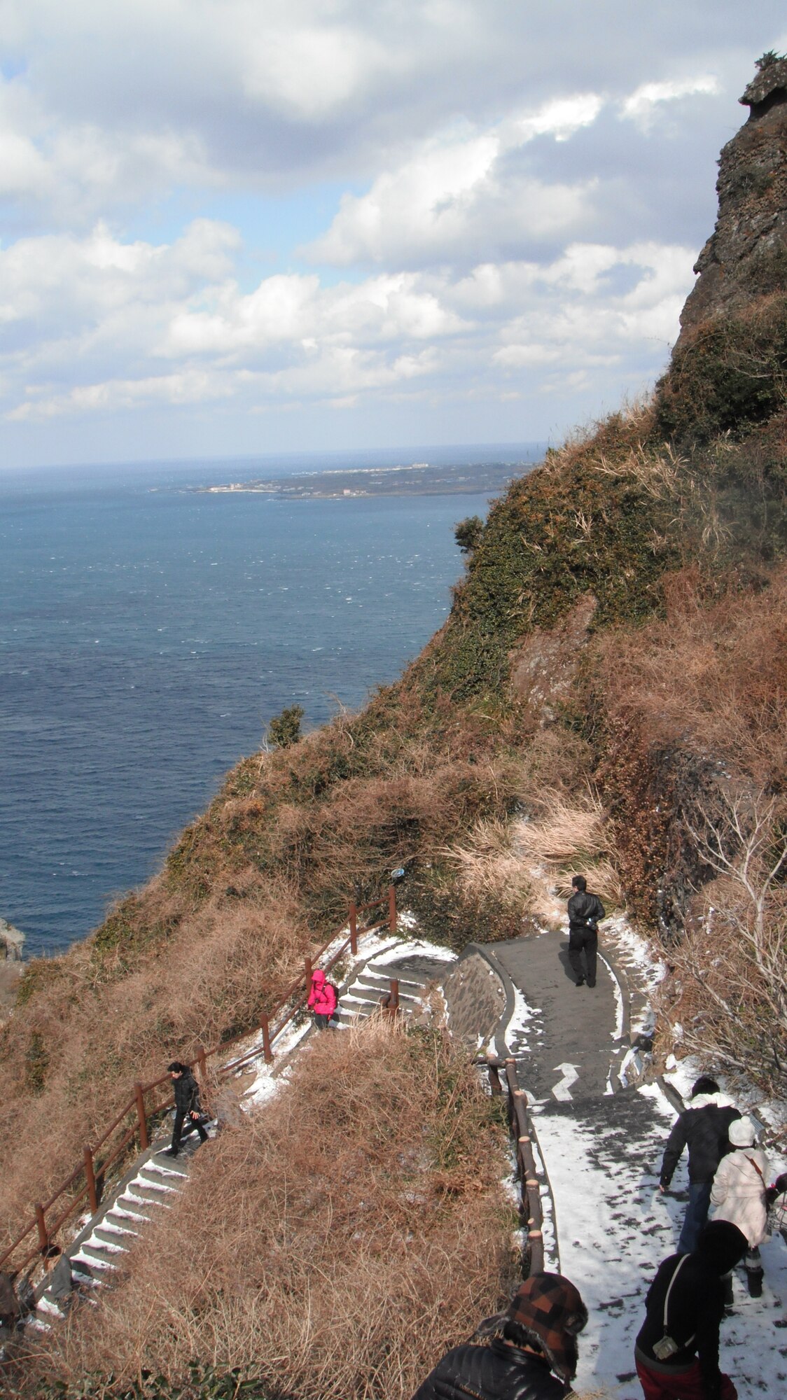 Visitors descend a trail at Seongsan Ilchulbong, or "sunrise peak,"
on Jeju Island, Republic of Korea. (U.S. Air Force photo/Staff Sgt. Eric
Burks)
