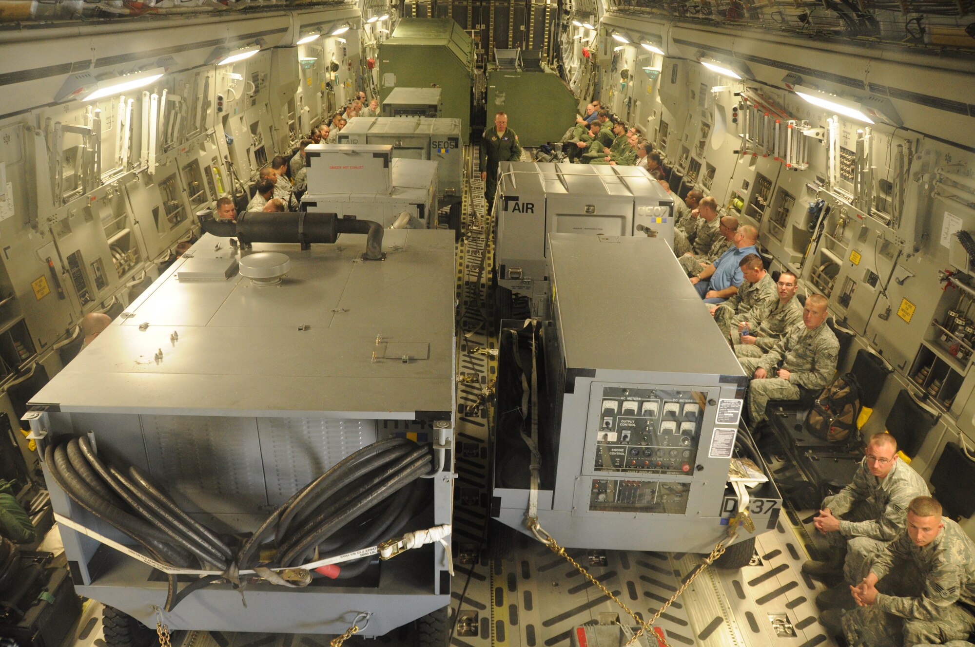 The cargo compartment of a C-17 Globemster III aircraft from Joint Base Charleston, S.C. is loaded with 50,000 lbs. of cargo and a combined team of 50 Airmen and contractors from the 325th Maintenance Group at Tyndall Air Force Base, Fla. A crew of Reserve Airmen from the 315th Airlift Wing at JBC transported the team and their cargo to Naval Air Station Key West, Fla. March 16, 2012. (U.S. Air Force photo/Staff Sgt. Shane Ellis)