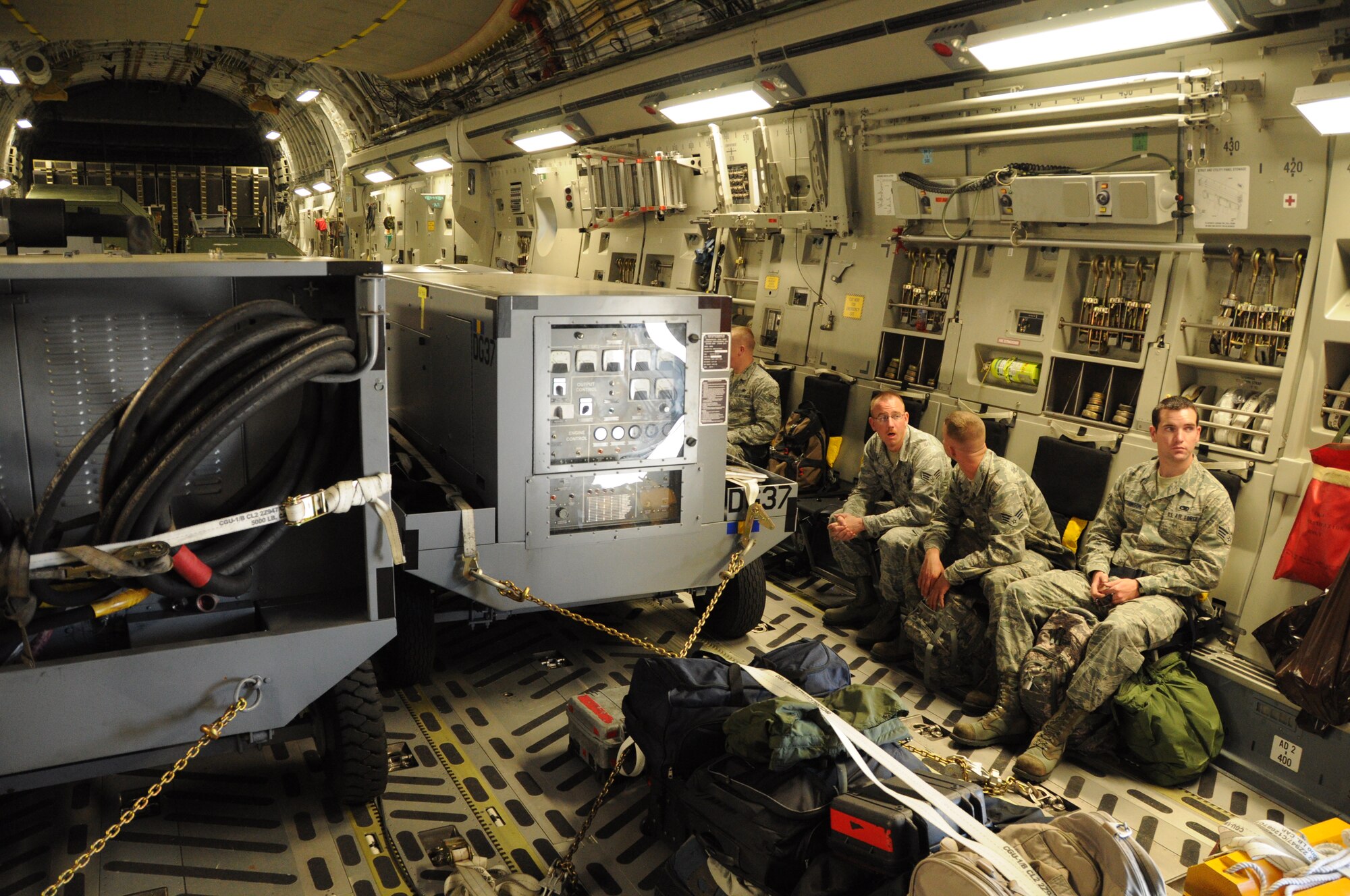 The cargo compartment of a C-17 Globemster III aircraft from Joint Base Charleston, S.C. is loaded with 50,000 lbs. of cargo and a combined team of 50 Airmen and contractors from the 325th Maintenance Group at Tyndall Air Force Base, Fla. A crew of Reserve Airmen from the 315th Airlift Wing at JBC transported the team and their cargo to Naval Air Station Key West, Fla. March 16, 2012. (U.S. Air Force photo/Staff Sgt. Shane Ellis)