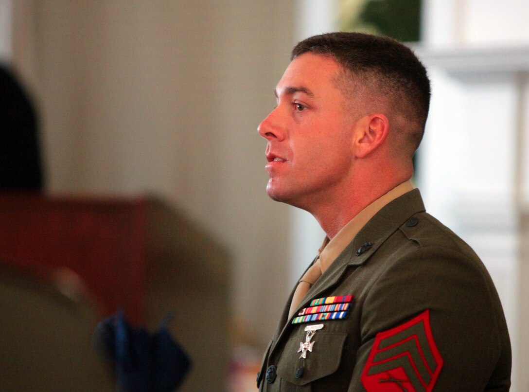 Sergeant John Margaritondo sits in attendance as the guest of honor to be awarded the Marine of the Month award by the Jacksonville-Onslow Military Affairs Committee March 19.