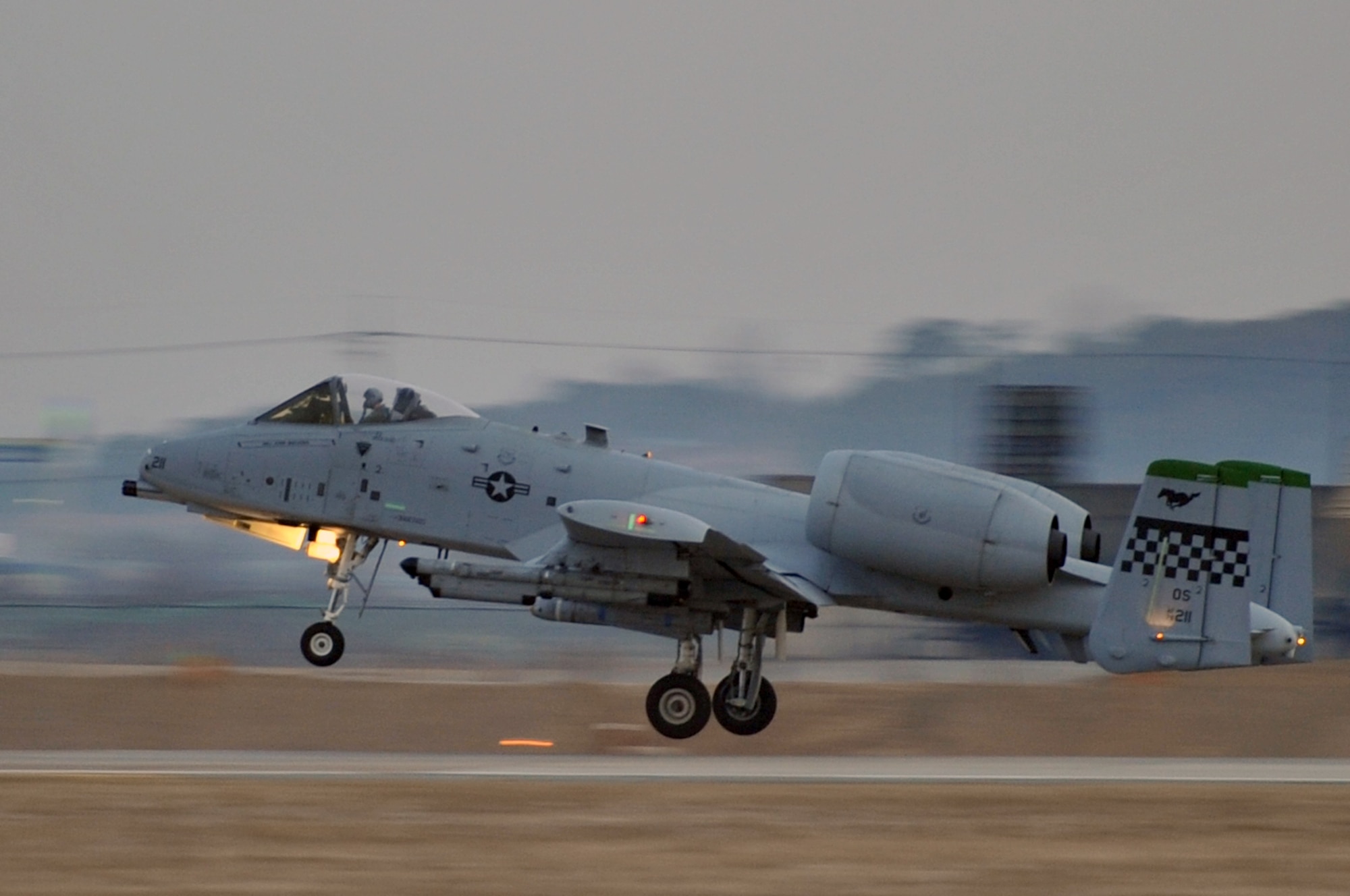 The first A-10 Thunderbolt II sortie for operational readiness exercise Beverly Midnight 12-01 takes off from Osan Air Base, March 20, 2012. Osan’s Airmen provide combat ready forces for close air support, air strike control, counter air, interdiction, theater airlift, and communications in the defense of the Republic of Korea, and the exercise tests these abilities during a heightened state of readiness.  (U.S. Air Force photo/Staff Sgt. Craig R. Cisek)