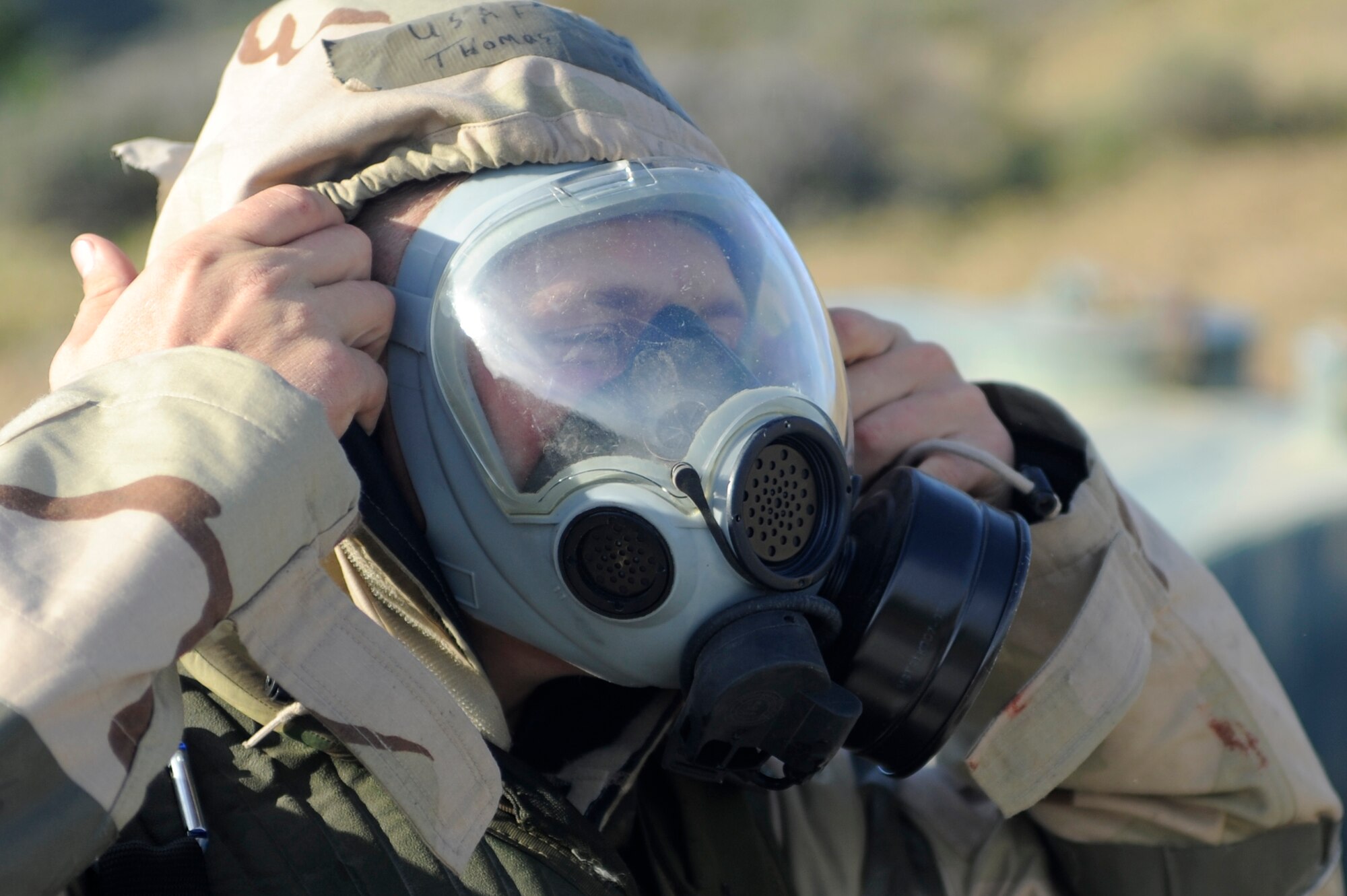 VANDENBERG AIR FORCE BASE, Calif. -- Airman 1st Class Thomas Shea, 30th Civil Engineer Squadron member, takes a protective gas mask off during the Northstar exercise training here Thursday, March 15, 2012. The Northstar exercise tests the deployment capabilities and combat readiness skills for Airmen. (U.S. Air Force photo/Staff Sgt. Andrew Satran) 

 