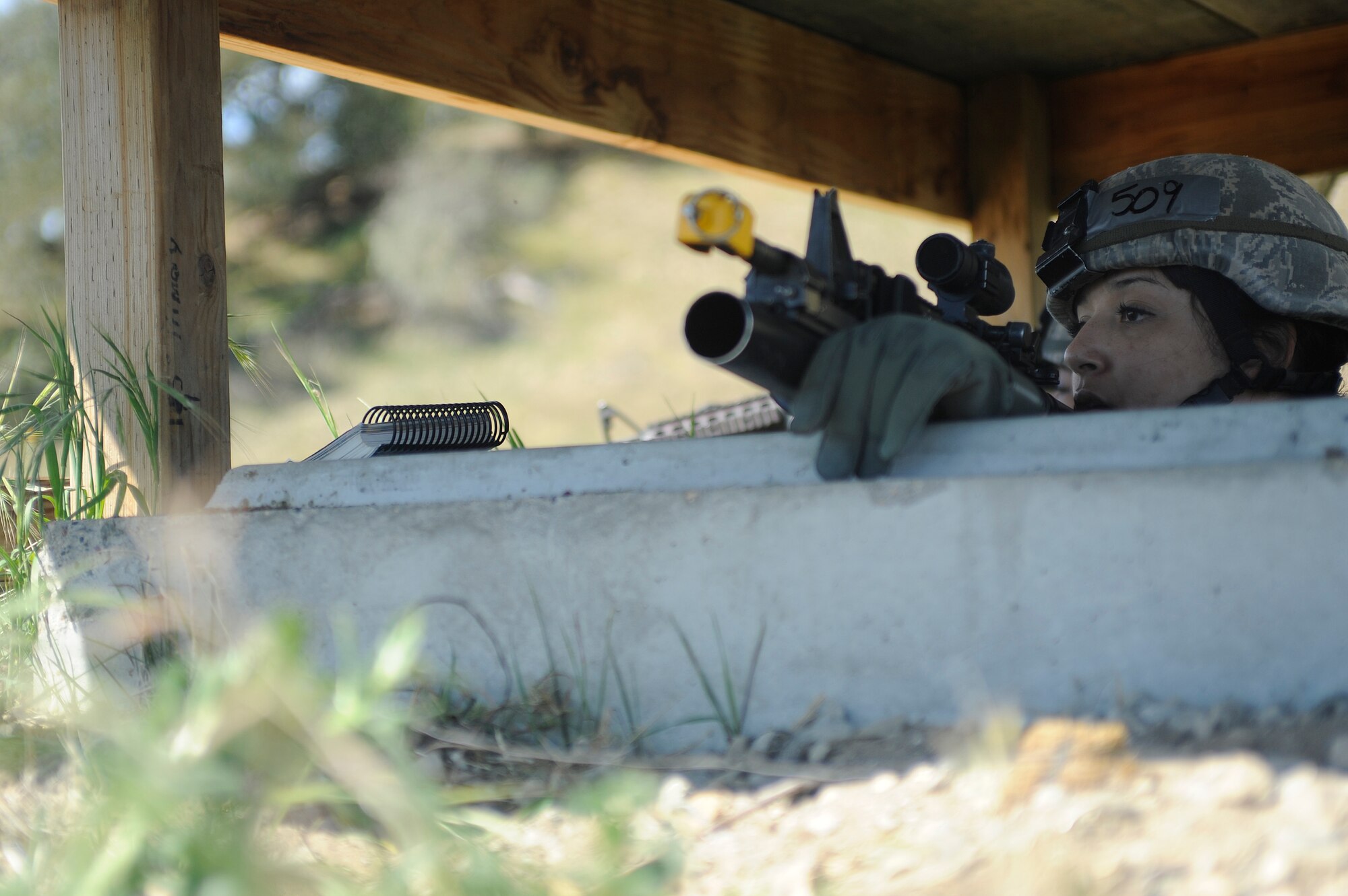 VANDENBERG AIR FORCE BASE, Calif. -- Senior Airman Janette Molina, 30th Security Forces Squadron member, scans her area of responsibility in a defensive fighting position during the Northstar exercise training here Tuesday, March 13, 2012. The Northstar exercise tests deployment capabilities and combat readiness skills for Airmen. (U.S. Air Force photo/Staff Sgt. Andrew Satran) 



 