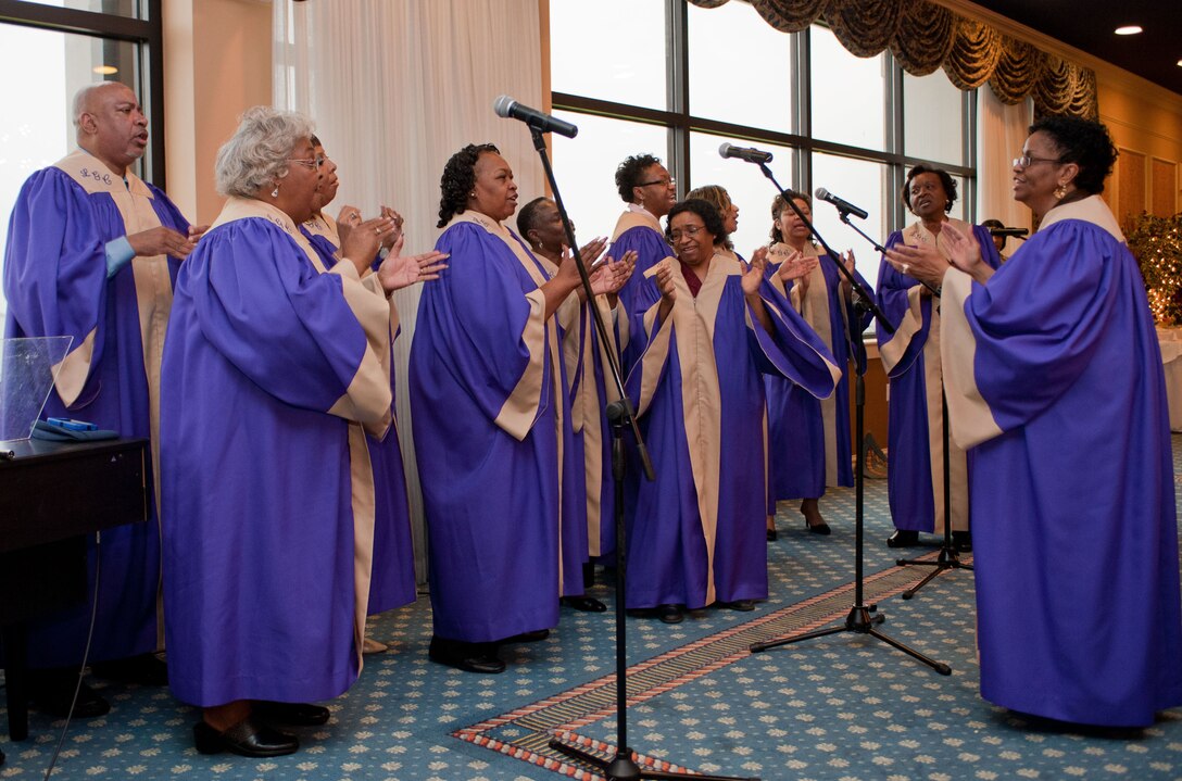 The Langley Gospel Choir sings during the Joint Base Langley-Eustis National Prayer Breakfast March 13, 2012, at Langley Air Force Base, Va.  The ceremony featured readings from representatives of different faiths including Christity, Islam and Judaism.  (U.S. Air Force photo by Senior Airman Stephanie Rubi/Released)