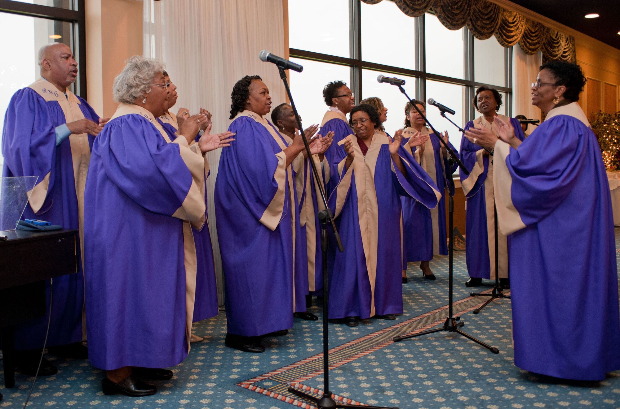 The Langley Gospel Choir sings during the Joint Base Langley-Eustis National Prayer Breakfast March 13, 2012, at Langley Air Force Base, Va.  The ceremony featured readings from representatives of different faiths including Christity, Islam and Judaism.  (U.S. Air Force photo by Senior Airman Stephanie Rubi/Released)