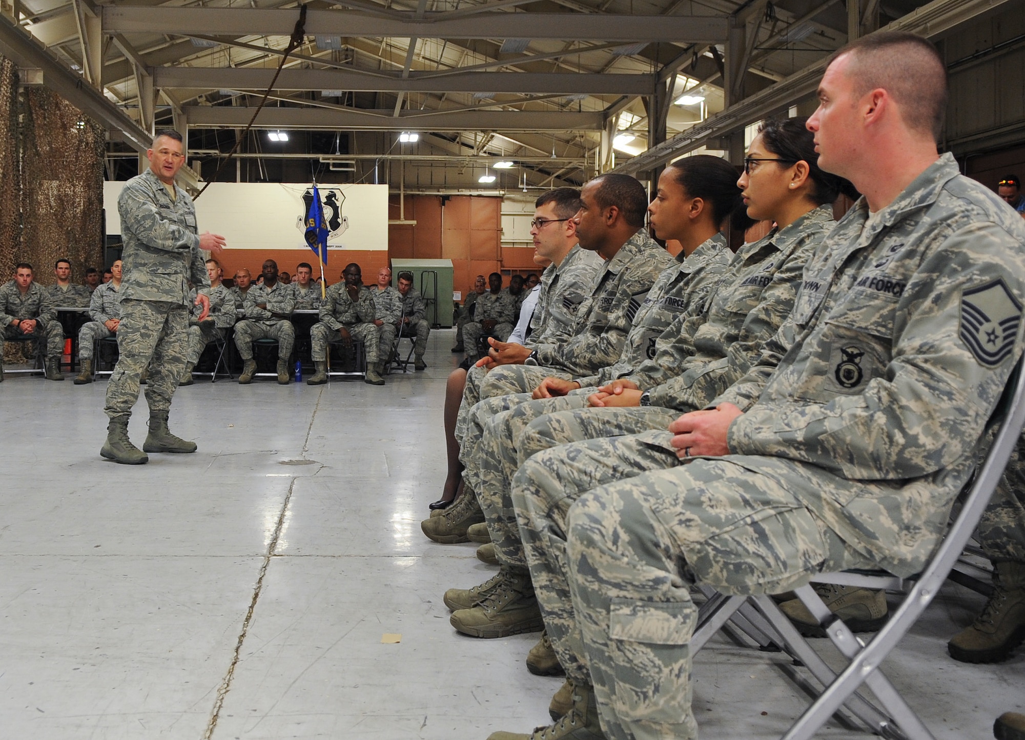 U.S. Air Force Col. Randall Richert, 820th Base Defense Group commander, speaks to Airmen from the 820th BDG during the unit’s 15-year anniversary ceremony at Moody Air Force Base, Ga., March 16, 2012. Richert spoke about the establishment of the group and the major role it plays in the Air Force. (U.S. Air Force photo by Airman 1st Class Olivia Dominique/Released)