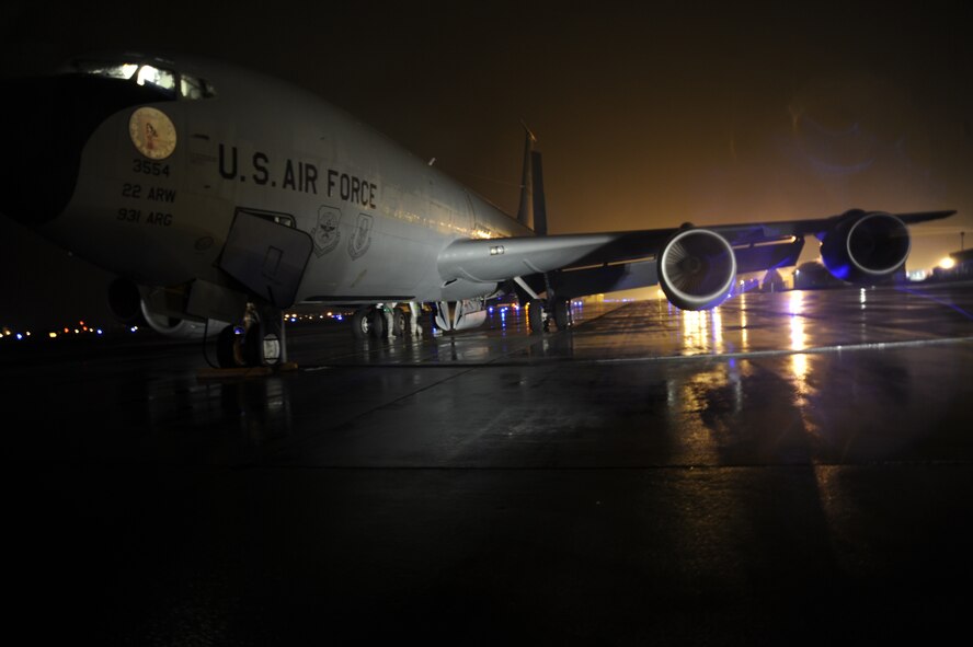 A KC-135 Stratotanker from McConnell Air Force Base, Kansas stands ready on the runway at Fairchild Air Force Base, Wash., March 15, 2012 prior to taking off for a night refueling mission. Aircrews from McConnell are participating in a two-week multi-lateral exercise, which not only simulates but prepares Airmen for a deployed environment.   (U.S. Air Force photo by Airman 1st Class Ryan Zeski) 