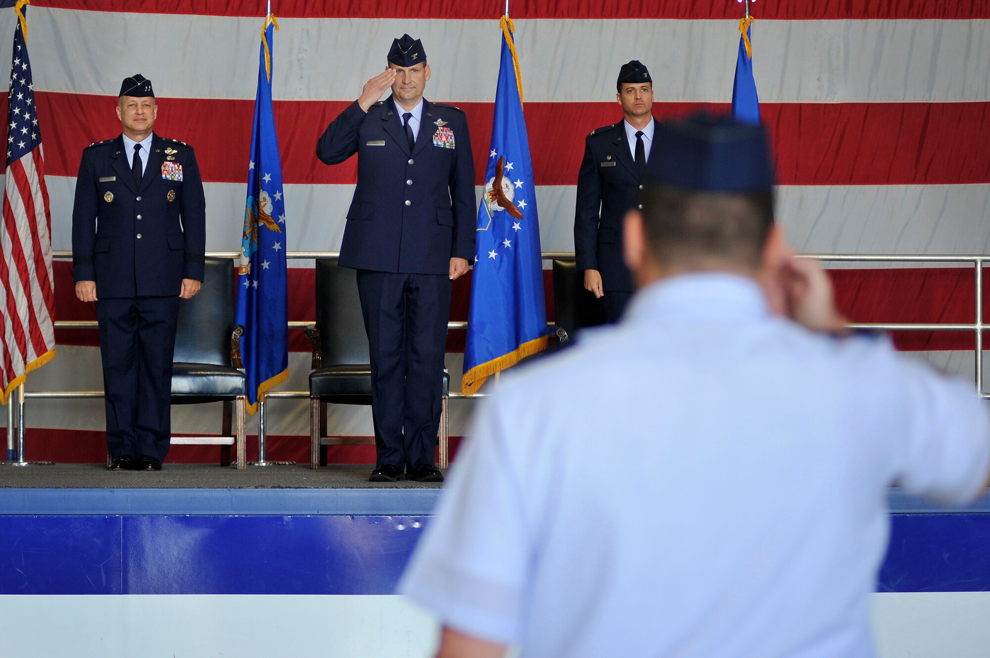 U.S. Air Force Col. Clay Hall, 20th Fighter Wing commander, is saluted by Airmen of the 20th FW for the first time after taking command of the unit during a change of command ceremony, March 19, 2012, Shaw Air Force Base, S.C. Hall took command from Col. Charlie Moore, who will proceed to his next assignment commanding the 57th Wing, Nellis Air Force Base, Nev. Prior to taking command of the 20th FW, Hall was serving as the 455th Expeditionary Operations Group commander at Bagram Air Base, Afghanistan. (U.S. Air Force photo by Senior Airman Kenny Holston/Released)

