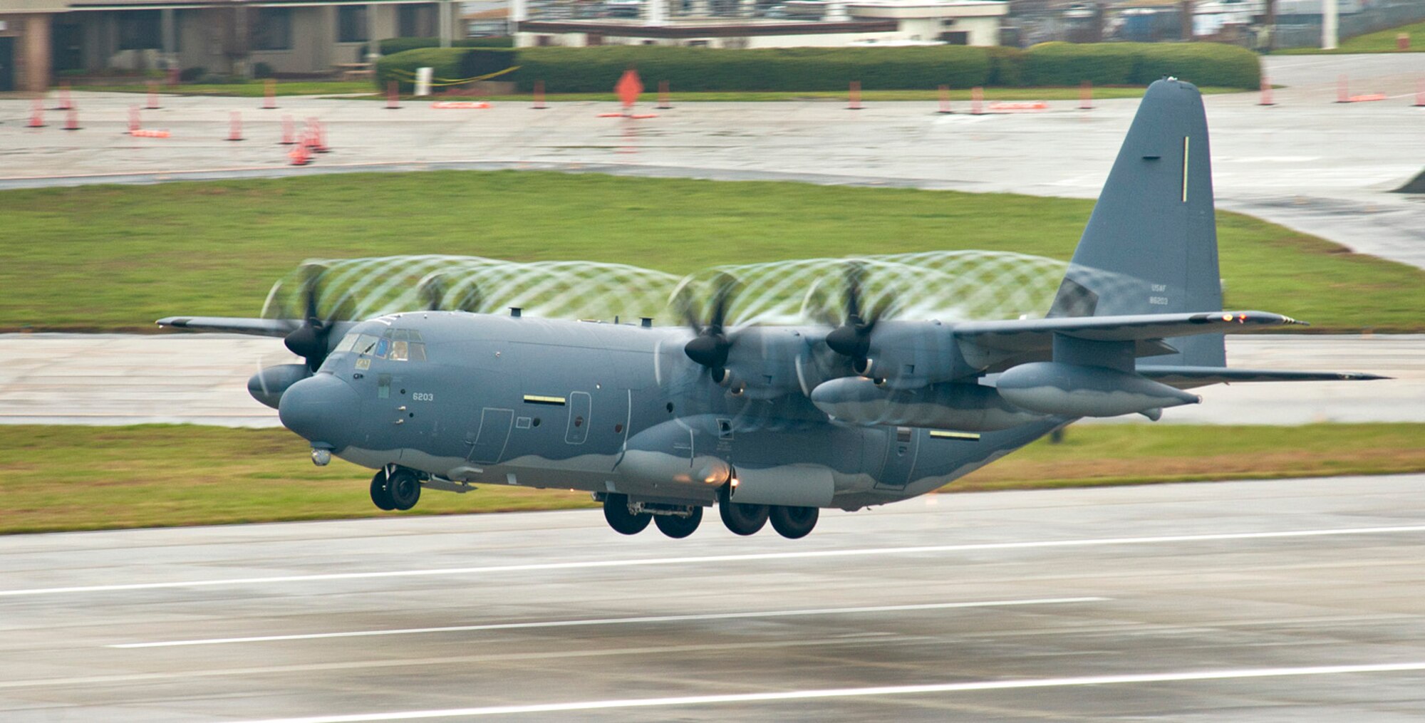 MARIETTA, Ga., -- An MC-130J Combat Shadow II takes off from Lockheed Martin in Marietta, Ga., March 13. Gen. Edward A. Rice, Jr., commander of Air Education and Training Command delivered aircraft 5682 to Kirtland Air Force Base, N.M. "The C-130J is the backbone of the mobility fleet and a critical component in our Airmen's ability to fly, fight and win," said Rice. "It is an honor to deliver the newest member of the Kirtland fleet." This is the 2,406th Hercules delivered to date.  (Lockheed Martin photo by Todd McQueen)