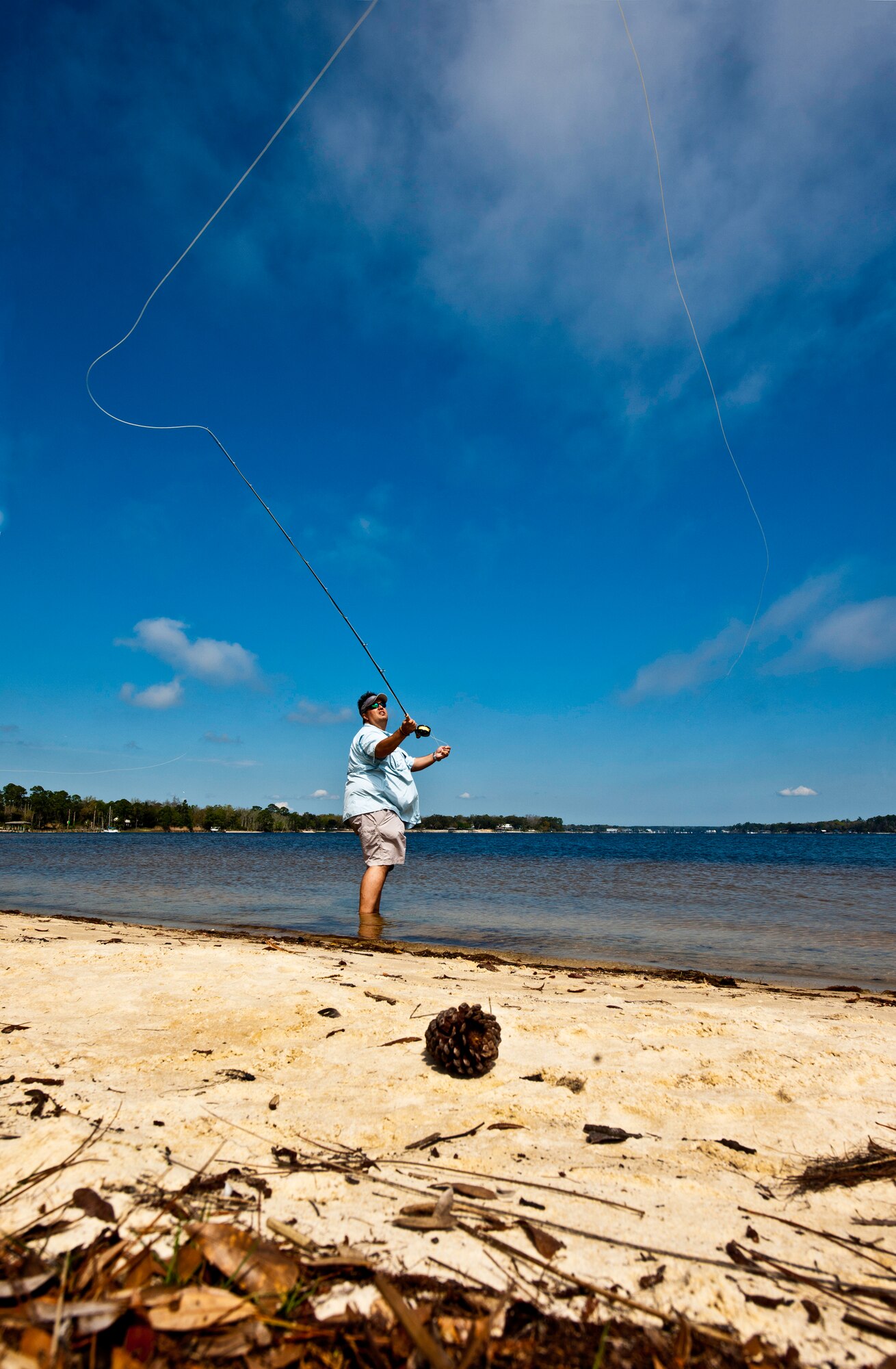 Lee Murphy practices fly-fish casting during a Fly Fishing 101 class at Eglin Air Force Base, Fla., March 17.  Participants were instructed on how to tie lures and hooks and how to cast with the fly fishing rod during the three-hour class.  Outdoor Recreation hosts two more classes April 21 and May 19 from 9 a.m. to noon.  For more information or to sign up, call 882-5058.  (U.S. Air Force photo/Samuel King Jr.)