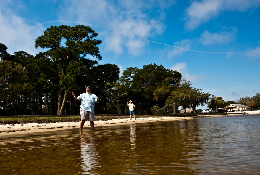 Lee Murphy and Mark Hayes practice fly-fish casting during a Fly Fishing 101 class at Eglin Air Force Base, Fla., March 17. Participants were instructed on how to tie lures and hooks and how to cast with the fly fishing rod during the three-hour class. Outdoor Recreation hosts two more classes April 21 and May 19 from 9 a.m. to noon. Classes are open to active duty, reserve and civilians with access to the base. For more information or to sign up, call 882-5058.   (U.S. Air Force photo/Tech. Sgt. Samuel King Jr.) 
