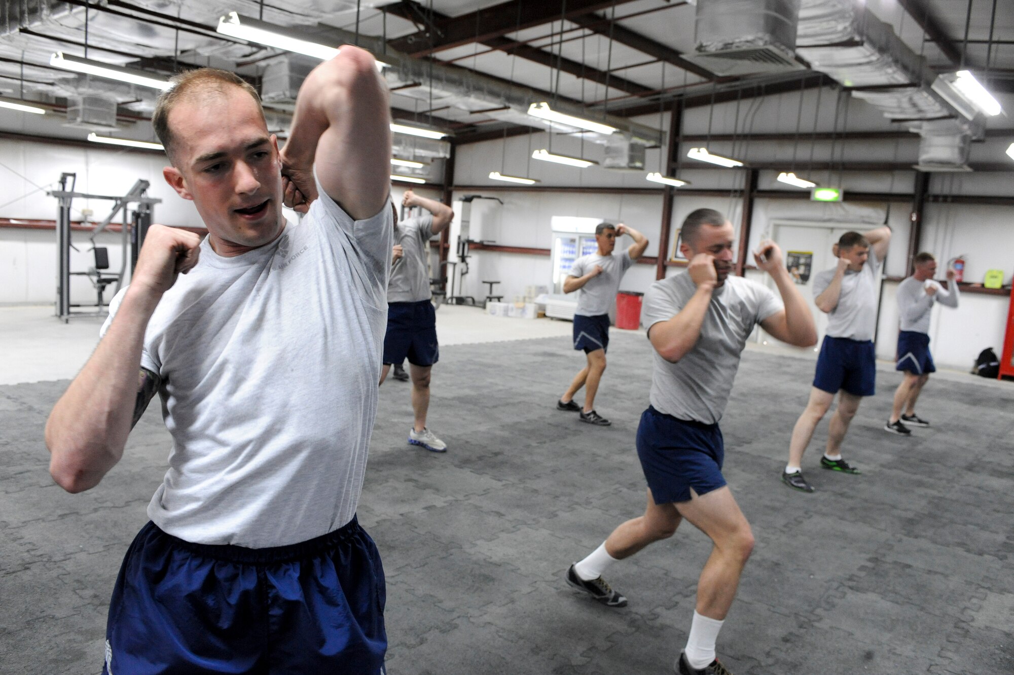 SOUTHWEST ASIA -- Airman 1st Class Alexander Banach, 332nd Expeditionary Force Support Squadron member, performs elbow strikes during a Krav Maga class at an undisclosed location in Southwest Asia, March 14, 2012. The class trained Airmen on defensive techniques used in aggressive encounters. Banach is deployed from Little Rock Air Force Base, Ark., and is a native of Plattsburg, N.Y. (U.S. Air Force Photo by Staff Sgt. Joshua J. Garcia)