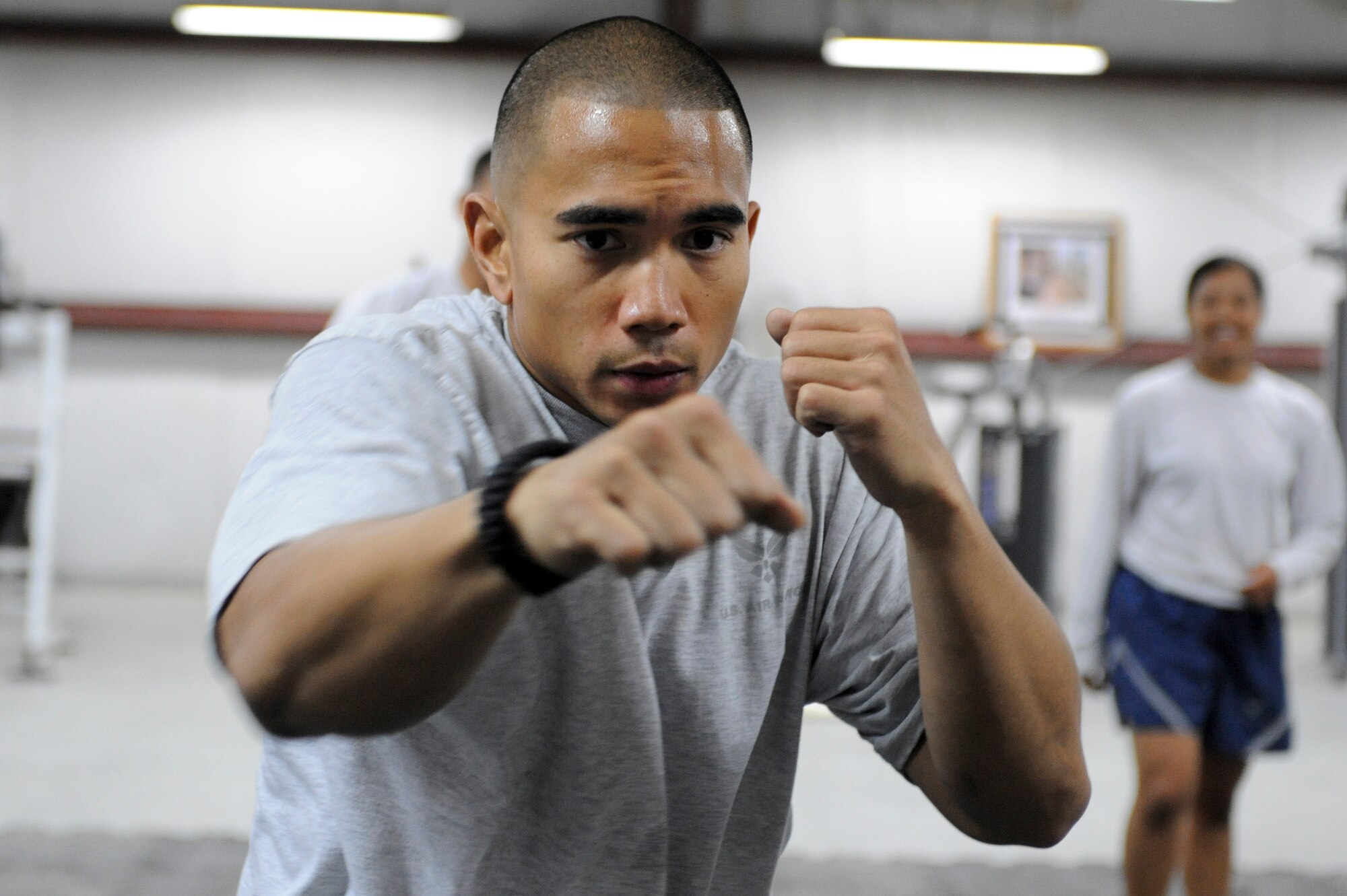 SOUTHWEST ASIA -- Rolando Collantes, 332nd Expeditionary Maintenance Group member, performs jabs during a Krav Maga self-defense class at an undisclosed location in Southwest Asia, March 12, 2012. The week-long class allowed Airmen to learn basic self-defense techniques against chokes, strangle-holds and small weapons attacks. Collantes is deployed from Shaw Air Force Base, S.C., and is a native of Mystic, Conn. (U.S. Air Force Photo by Staff Sgt. Joshua J. Garcia)