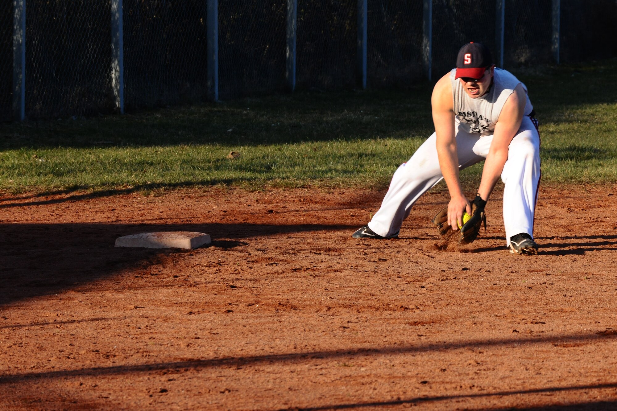 SPANGDAHLEM AIR BASE, Germany – David Frost, 52nd Component Maintenance Squadron, catches a ground ball during Spangdahlem men’s varsity softball tryouts held on Field 1 here March 15. The tryouts took place from March 12-16 and allowed men affiliated with the base an opportunity to try out for the team. The team will compete against other military service teams from throughout Europe during the 2012 season. (U.S. Air Force photo by Airman 1st Class Dillon Davis/Released)