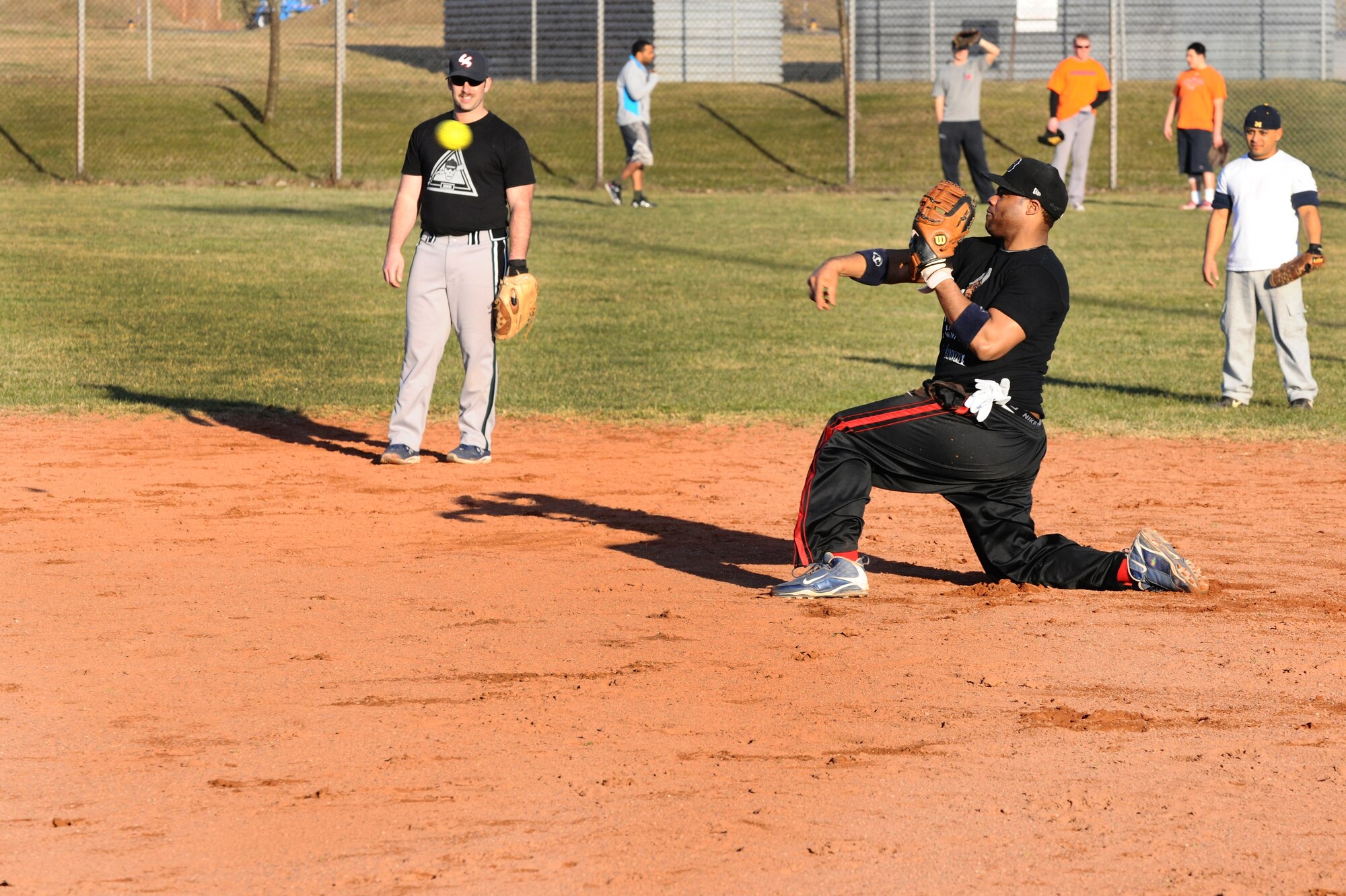 SPANGDAHLEM AIR BASE, Germany – Corey Dantzler, 52nd Security Forces Squadron, throws a softball to second base during Spangdahlem men’s varsity softball tryouts held on Field 1 here March 15. The tryouts took place from March 12-16 and allowed men affiliated with the base an opportunity to try out for the team. The team will compete against other military service teams from throughout Europe during the 2012 season. (U.S. Air Force photo by Airman 1st Class Dillon Davis/Released)