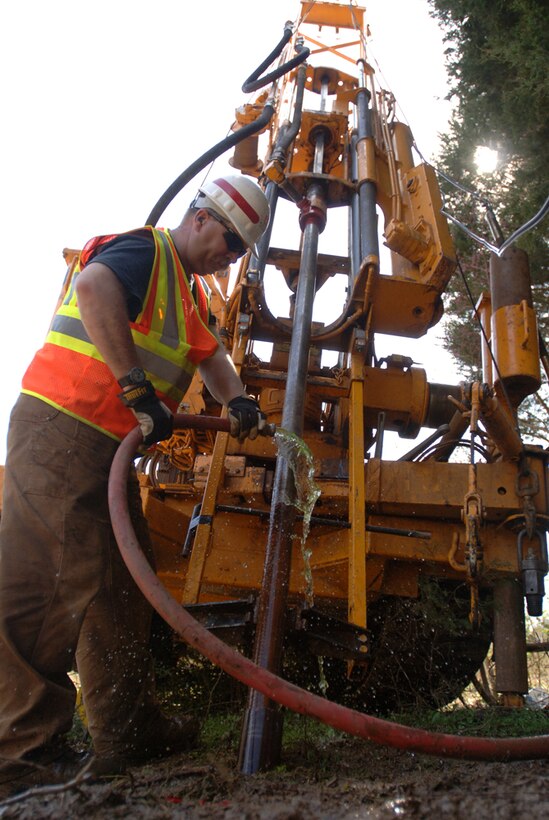 Drill Rig Operator John Blackson, U.S. Army Corps of Engineers Baltimore District, conducts drilling operations near the Nashville District's Saddle Dam at Center Hill Lake March 14, 2012. 