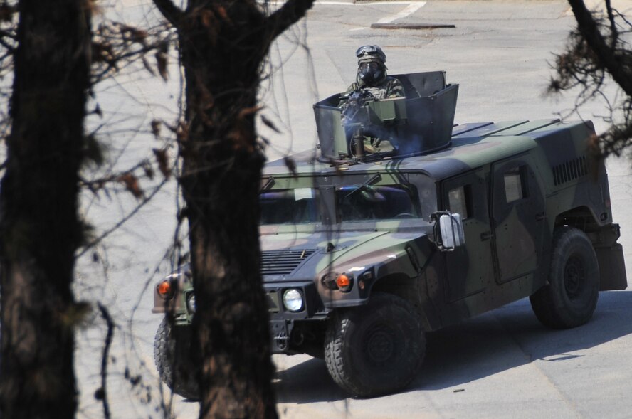Defenders from the 51st Security Forces Squadron open fire on opposing forces during operational readiness exercise Beverly Midnight 12-01, March 20, 2012. These scenarios test the 51st Fighter Wing’s abilities to work as a unit to defend the base and keep the mission running during a heightened state of readiness. (U.S. Air Force photo/Staff Sgt. Craig R. Cisek)