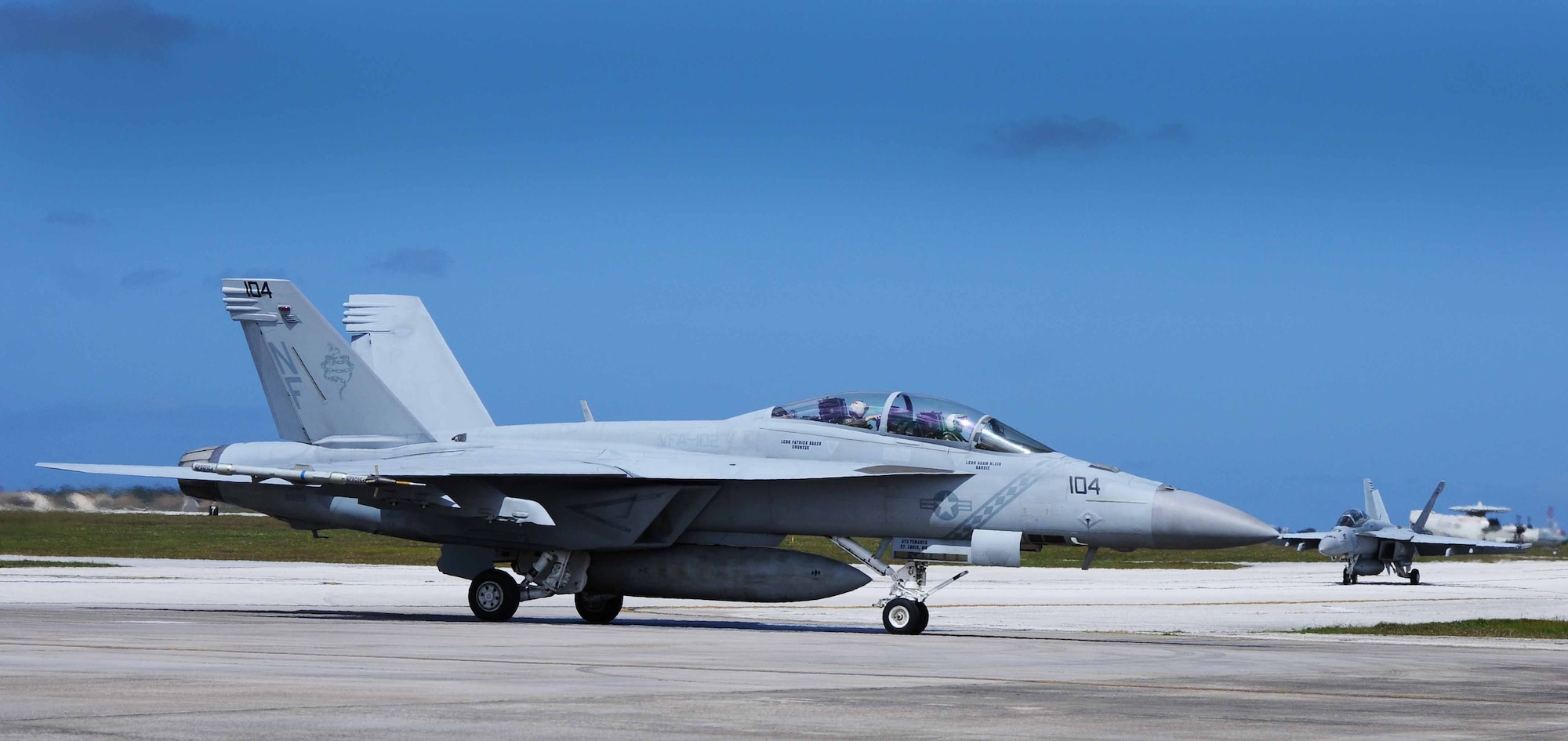 ANDERSEN AIR FORCE BASE, Guam - Two F-18's from Naval Air Station Oceana,
Virginia Strike Fighter Squadron 105 taxi after landing from a sortie, March
19. The program allows pilots to maintain their air to air and air to
ground capabilities proficient. (U.S. Air Force photo/Senior Airman Carlin
Leslie)
