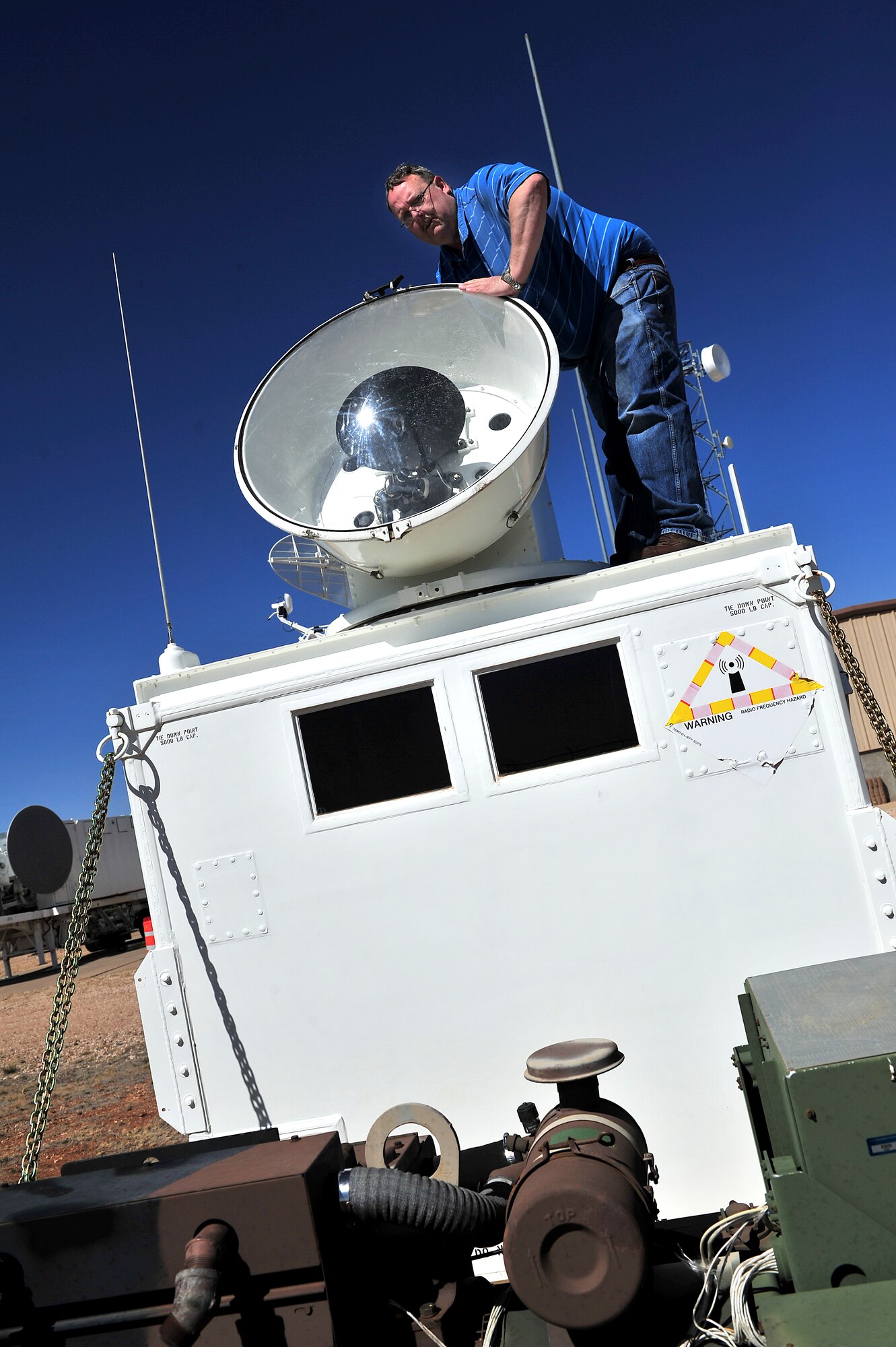 Ronald Moore, 27th Special Operations Support Squadron lead technician, adjusts a tactical radar threat generator used to simulate threats faced by aircrews at Melrose Air Force Range, N.M., March 5, 2012. Melrose Range provides space for realistic training of ground and air forces and is operated by Cannon Air Force Base, N.M. (U.S. Air Force photo by Tech. Sgt. Josef Cole)