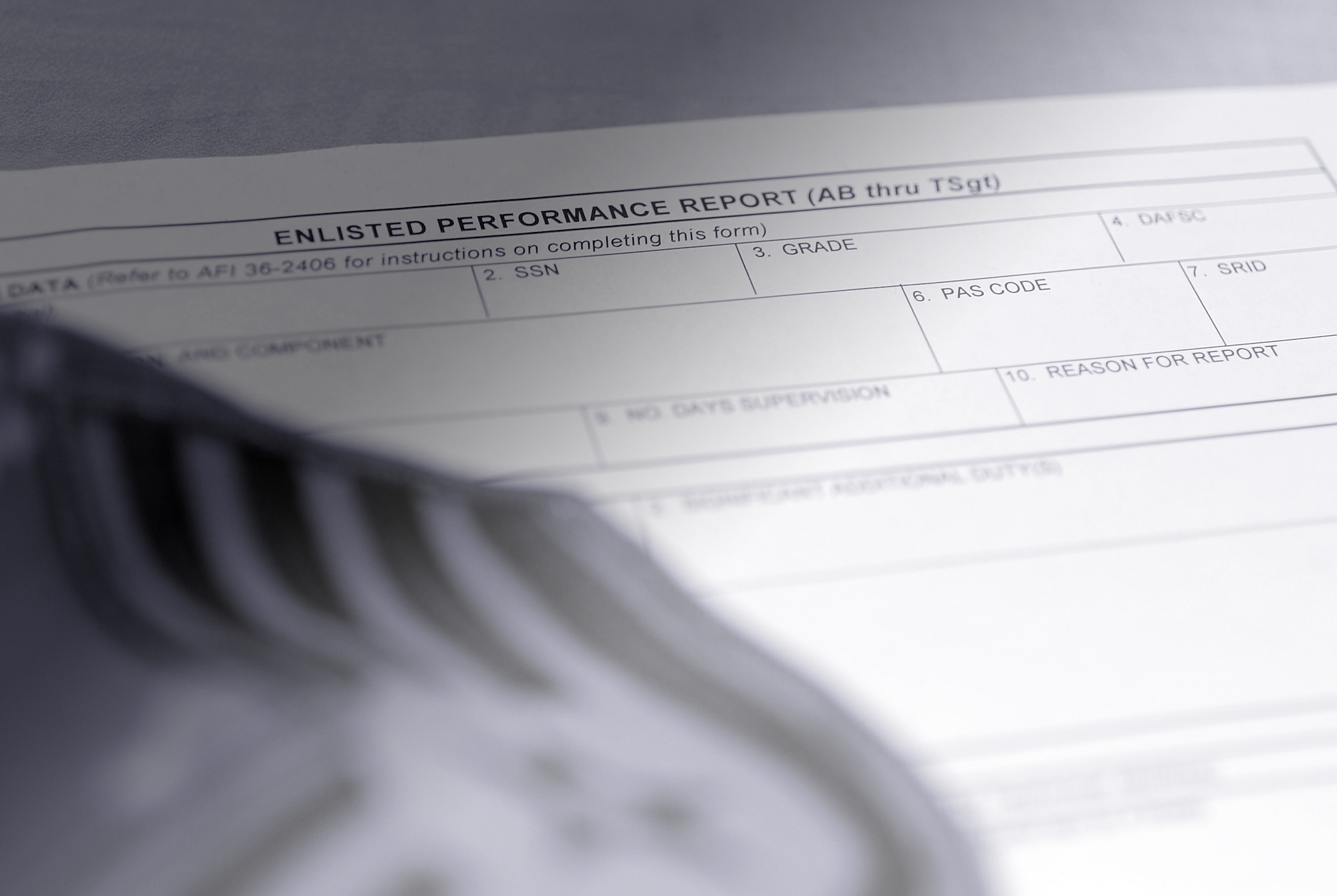 The wing's combined determination and focus raised the performance report on-time turn in rate to 97 percent. Enlisted and officer performance reports are a critical part of any Airman’s career. Promotions, paychecks and assignments are all impacted by EPR and OPR timeliness.(U.S. Air Force illustration/Senior Airman Gino Reyes/Released)