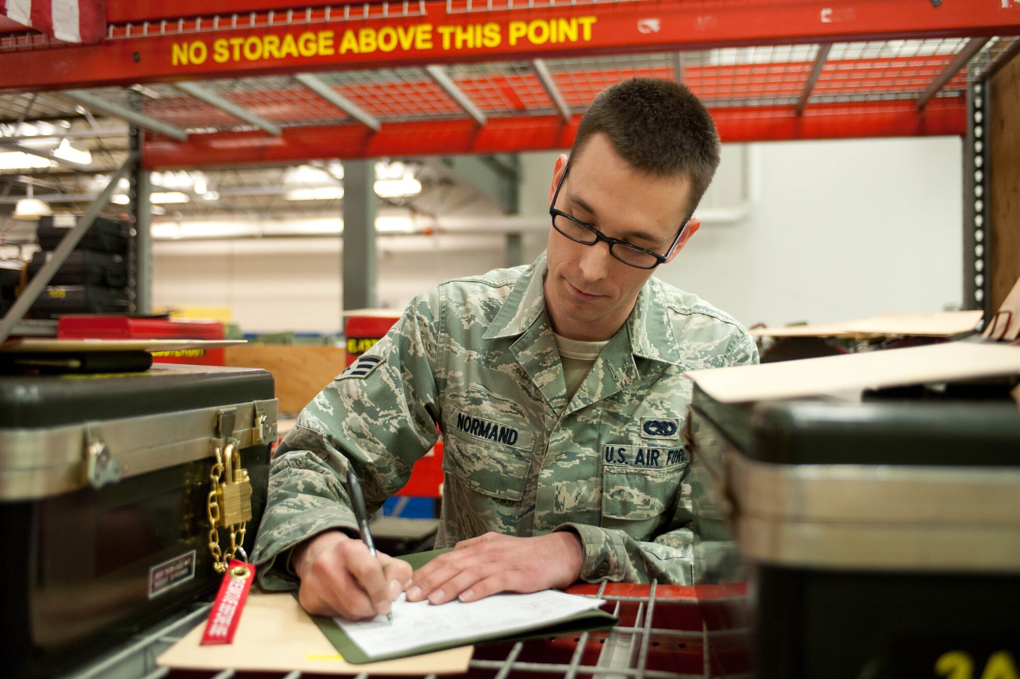 Senior Airman Dakota Normand, 28th Aircraft Maintenance Squadron composite tool kit specialist, inventories equipment during an Operational Readiness Exercise at Ellsworth Air Force Base, S.D., March 14, 2012. Normand and other CTK specialists manage tools and equipment for 28th AMXS maintainers every day at the tool room in the base bomb squadrons and maintenance areas. (U.S. Air Force photo by Airman 1st Class Zachary Hada/Released)