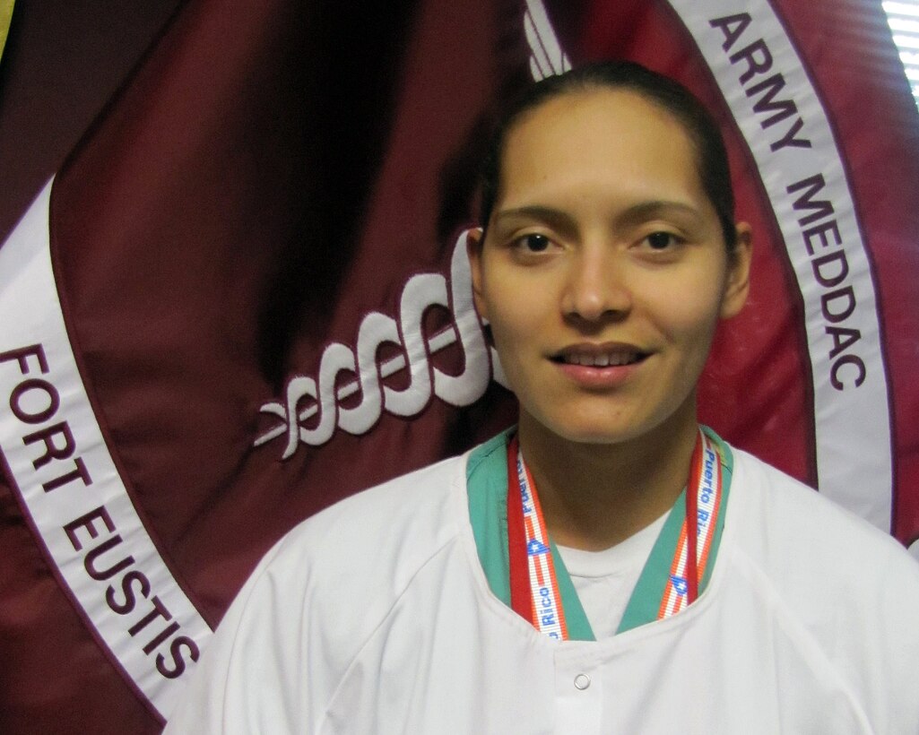 U.S. Army Spec. Jacqueline M. Lopez serves as an operating room technician at the MAHC.  A native of Luquillo, Puerto Rico, Lopez enlisted in the Army in September 2004 with two specific goals in mind - "to serve my country and to better myself."  Her career goals include finishing her biology degree with the purpose of applying for the Army Medicine Physician Assistance Course.   (Courtesy photo)