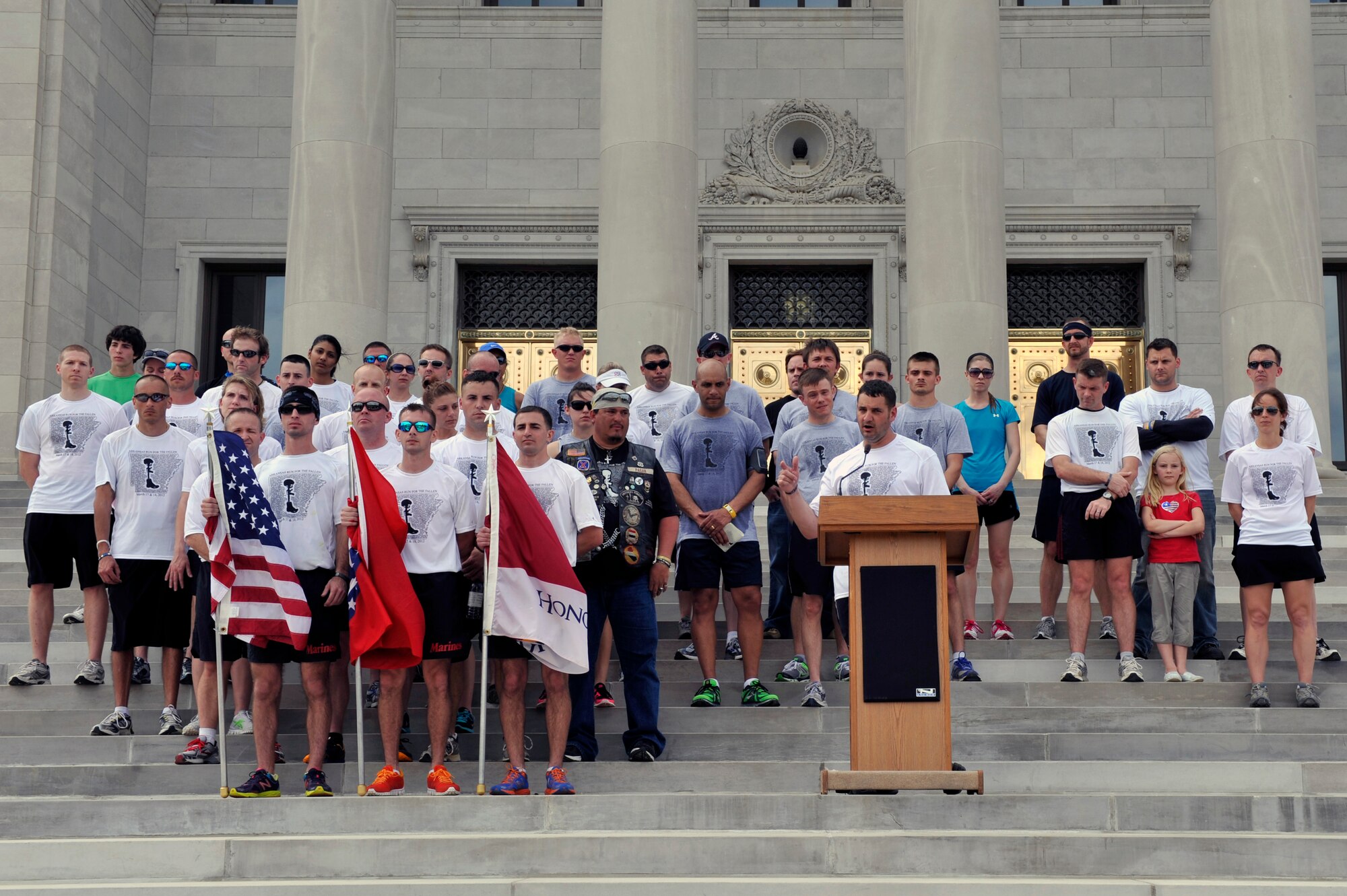 Senior Master Sgt. Bubba Beason, 19th Logistics Readiness Squadron first sergeant, speaks during the Arkansas Run for the Fallen March 18, 2012, outside the state capitol in Little Rock, Ark. Beason organized the first Arkansas Run as well as New Jersey Run for the Fallen. (U.S. Air Force photo by Airman 1st Class Rusty Frank)