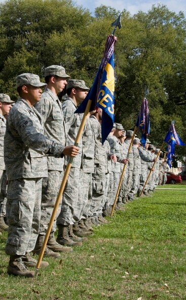Airmen from the 2nd Mission Support Group stand at parade rest during a retreat ceremony held by the 2 MSG on Barksdale Air Force Base, La., March 14. Retreat is played Mondays through Fridays at 5 p.m. on base to signify the end of the duty day. (U.S. Air Force photo/Airman 1st Class Benjamin Gonsier)(RELEASED)