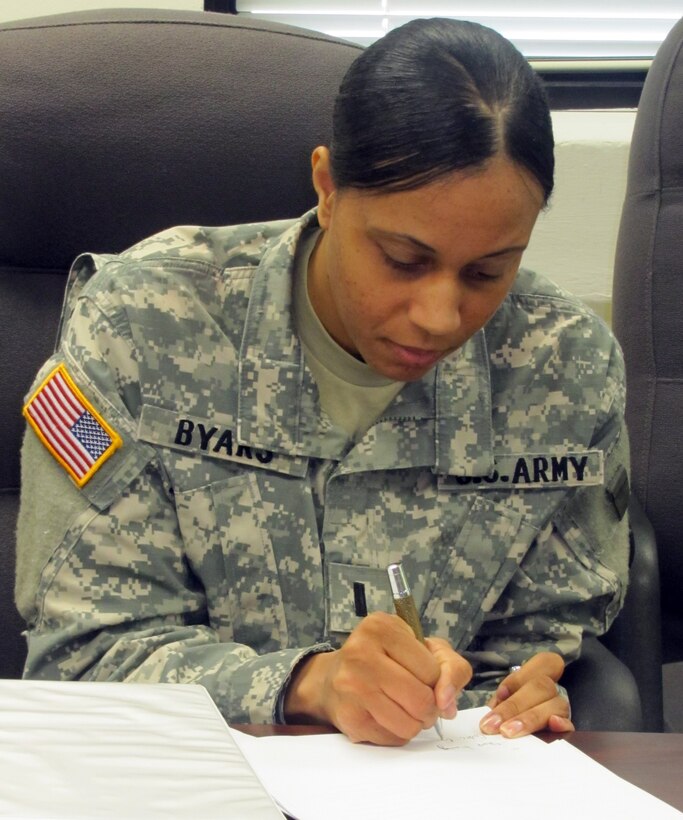 U.S. Army Capt. Lynette R. Byars, center, Warrior Transition Unit executive officer, is originally from Copperas Cove, Texas. Byars was actually born at Fort Hood, Texas.  Following in the footsteps of her father and several relatives who have retired from the Army, Byars enlisted into the Army in March 2002 to serve as a human resource information systems specialist at Fort Lewis, Wash.  In 2006, she reclassified as a computer operator/analyst and returned to Fort Lewis where she was direct selected for Officer Candidate School.  In January 2009, she was commissioned a second lieutenant. Byars began her officer career as a platoon leader for 1st Brigade Special Troops Battalion, 1 Heavy Brigade Combat Team, 2nd Infantry Division at Camp Hovey in the Republic of Korea.  Her goals include earning a technical certification from the Signal Captain's Course, and retiring from the Army where she said she has learned invaluable lessons in the past 10 years that no other organization could offer her.  Byars joined the Army to learn and develop as a leader, and because she would be capable of mentoring and training Soldiers.  . (U.S. Army photo by Marlon J. Martin/Released)