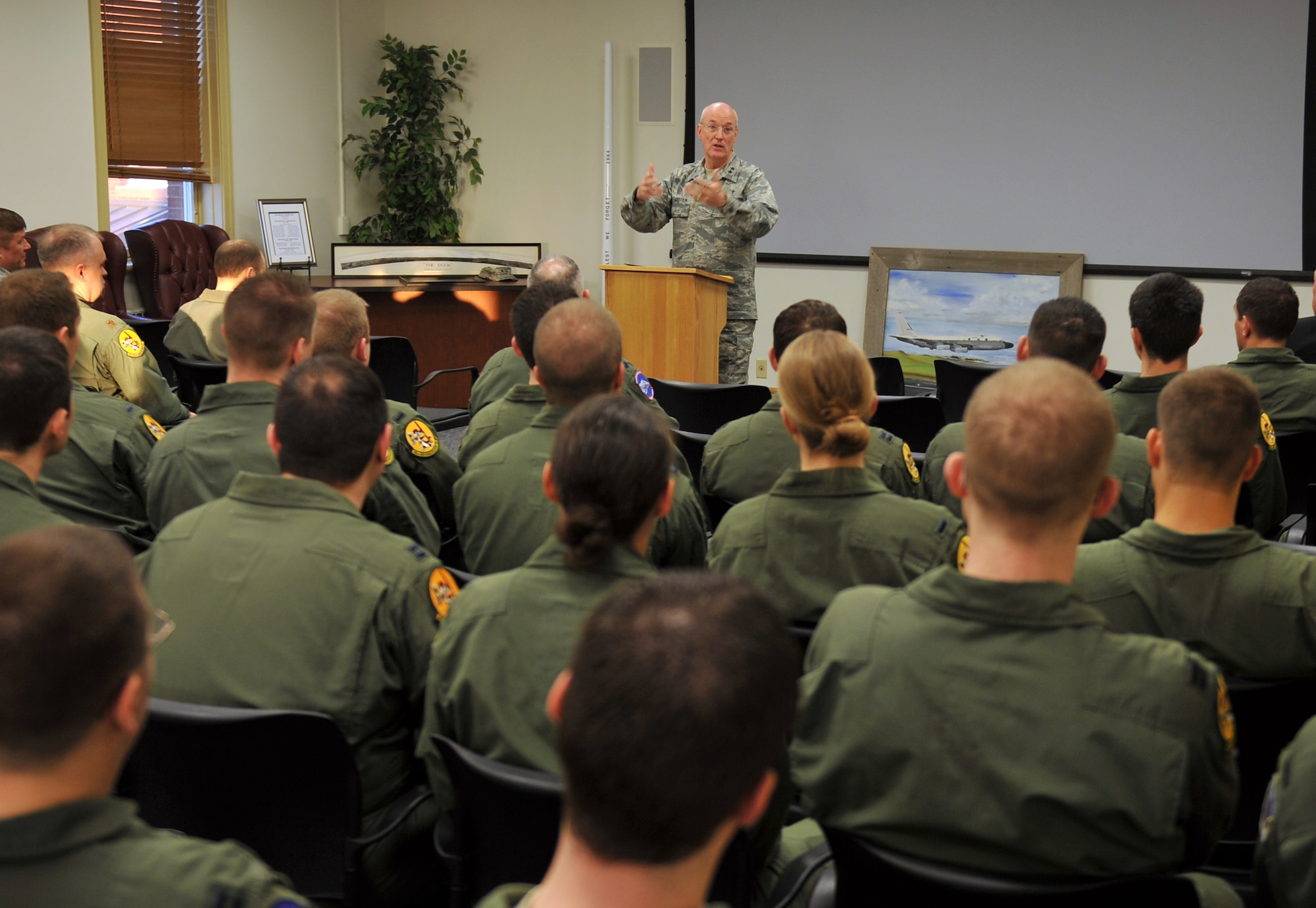 Chaplain (Maj. Gen.) Cecil Richardson speaks to Airmen at the 45th Reconnaissance Squadron Haun Auditorium at Offutt Air Force Base, Neb., March 16. Richardson gave a resiliency briefing to Airmen and also took time to visit a memorial in front of the 45th RS building. (Photo by Jeff Gates/Released)