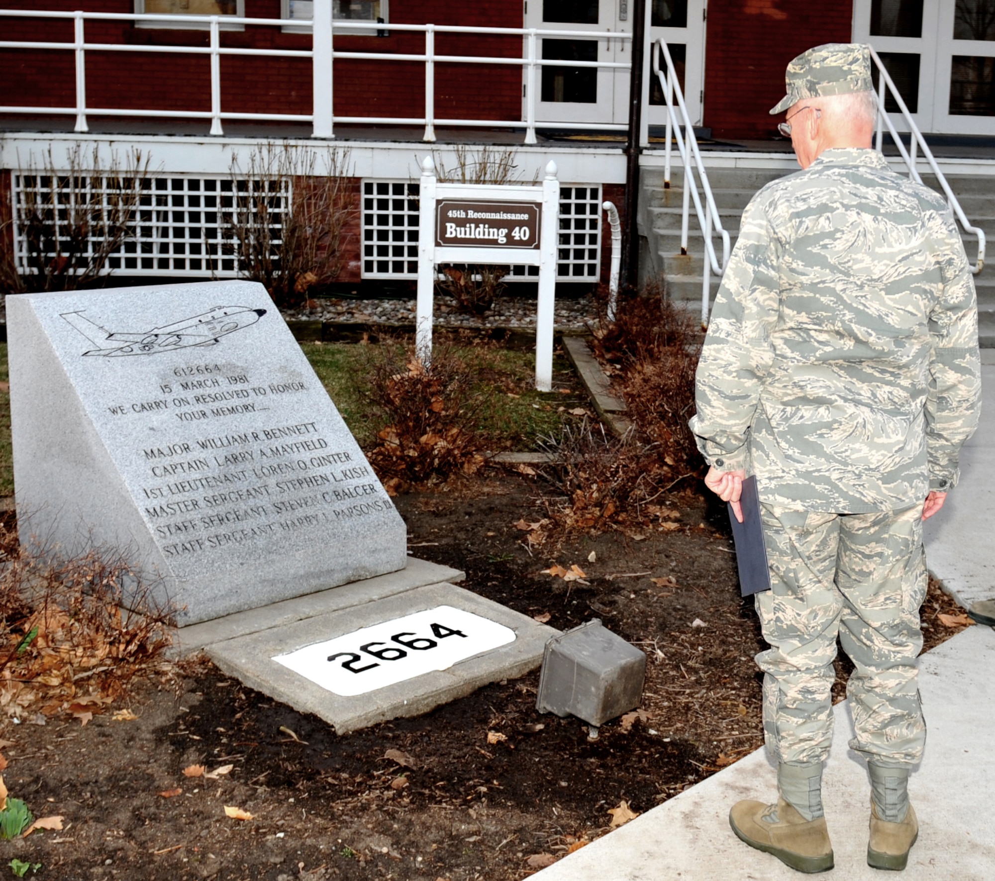 Chaplain (Maj. Gen.) Cecil Richardson takes a moment to look at a memorial for the crew of an RC-135S Cobra Ball that crashed at Shemya Air Force Base, Alaska, March 15, 1981 during his visit to Offutt Air Force Base, Neb., March 16. The memorial is just outside the 45th Reconnaissance Squadron building were Richardson gave a resiliency briefing to Airmen. (Photo by Jeff Gates/Released)