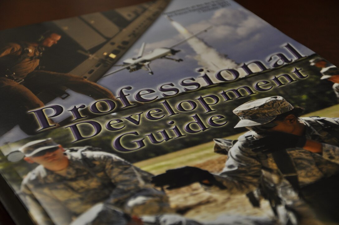 Air Force officials recently announced that some copies of the printed versions of the 2011 Professional Development Guide will need to be returned to unit Weighted Airman Promotion System monitors, as the documents may have a number of errors. At least 750 PDGs contain errors, so Airmen should review their copy of the PDG to make sure it does not contain any of the errors. (U.S. Air Force photo by Senior Airman Jason J. Brown/Released)
